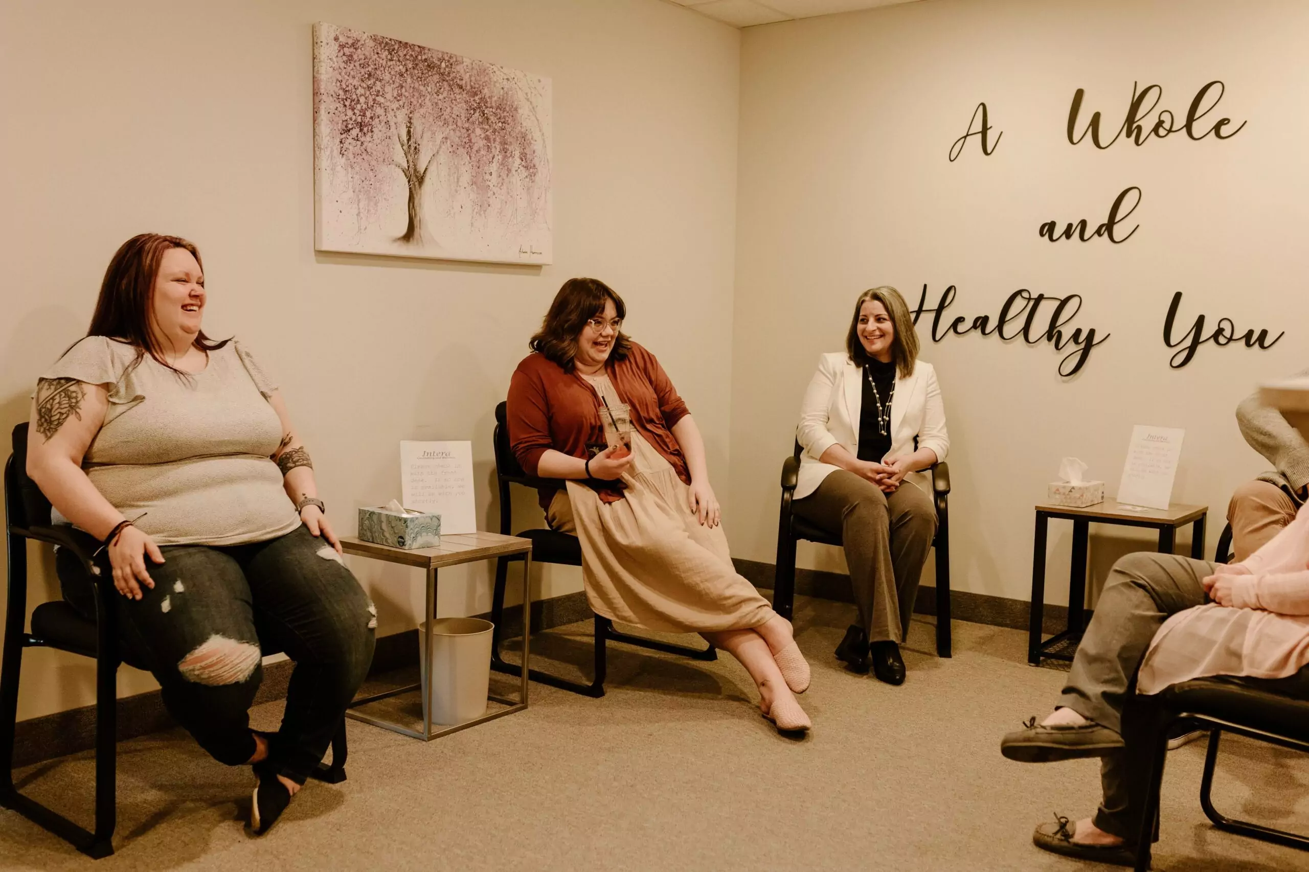 The staff of Intera sitting in the waiting room. From left to right: Taylour, Amanda, Mary.