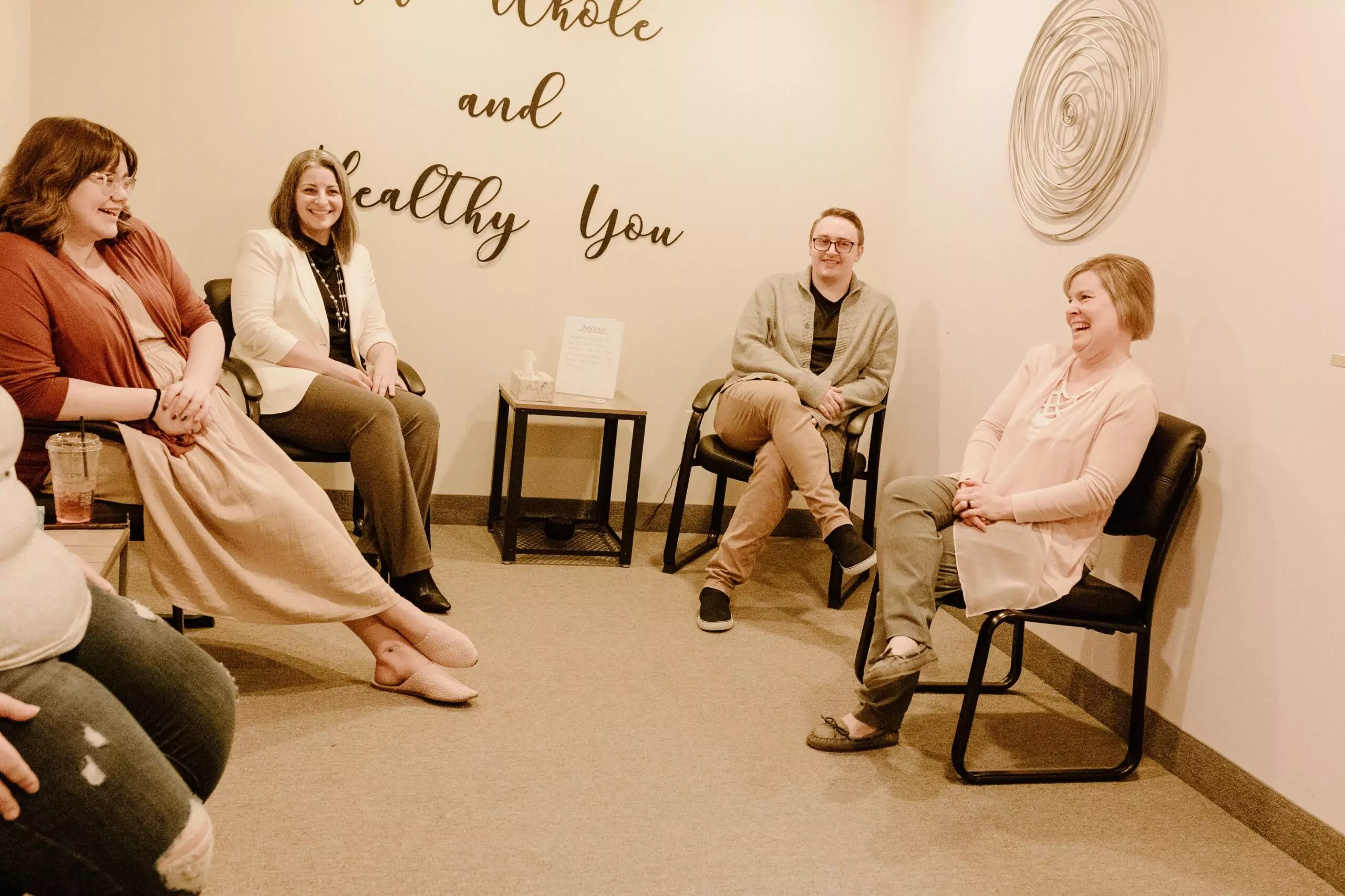 The staff of Intera sitting in the waiting room. From left to right: Amanda, Mary, Jared, Angela.